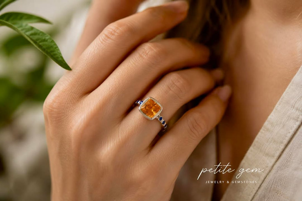 Nhẫn Citrine cắt cushion đính pha lê xanh