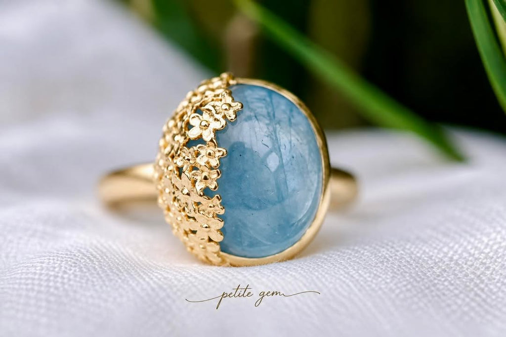 Nhẫn aquamarine hoa vàng