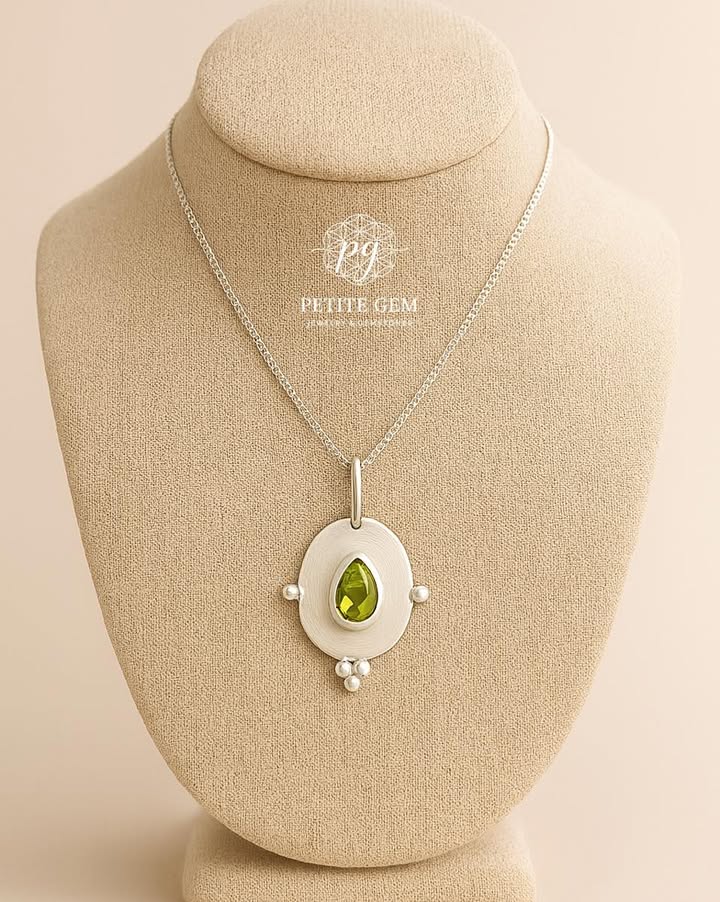 Dây chuyền mặt oval đính peridot giọt nước