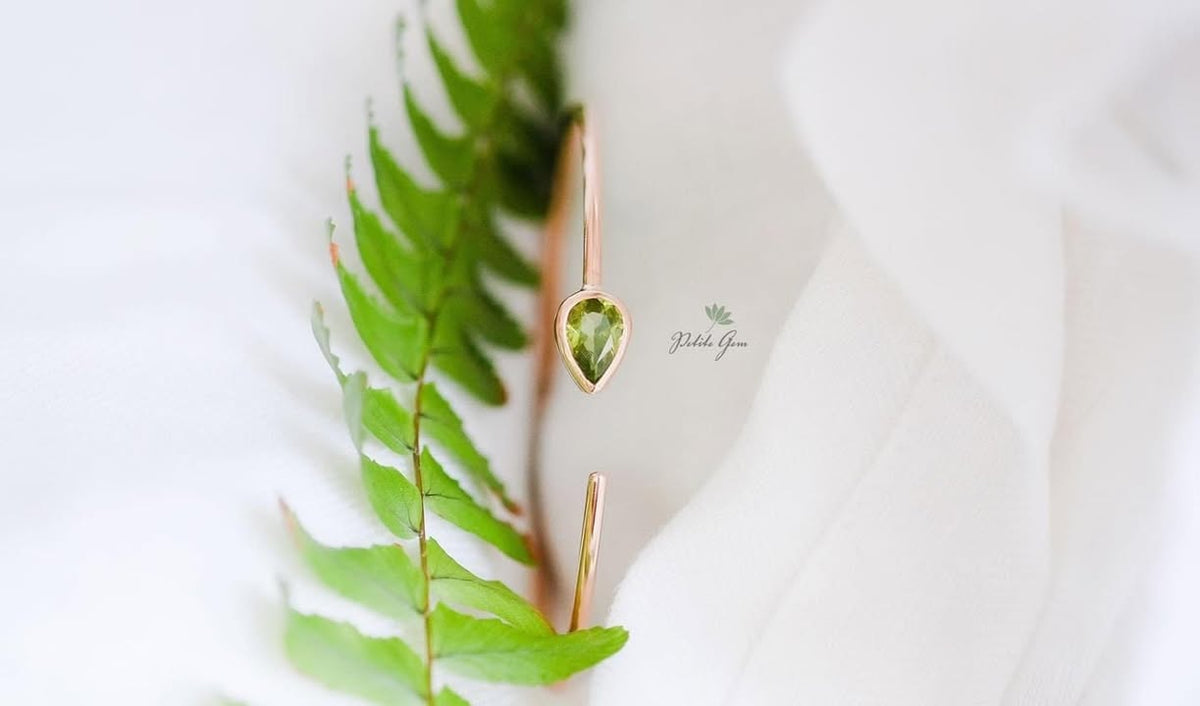 Lắc tay giọt đá peridot đính đá