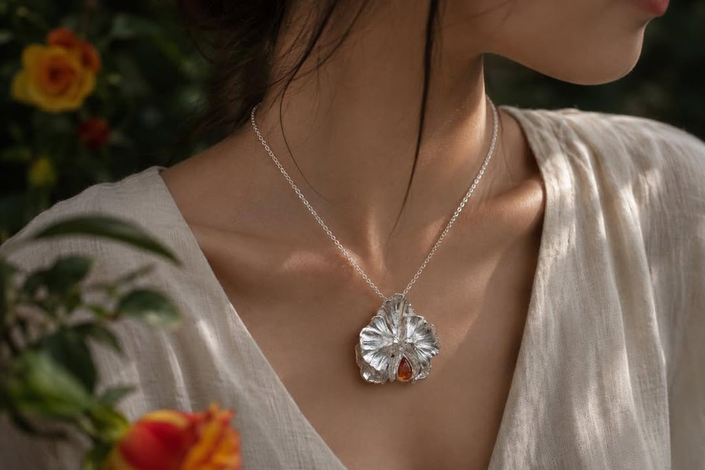 Dây chuyền hoa phong lan bạc phối đá Sunstone
