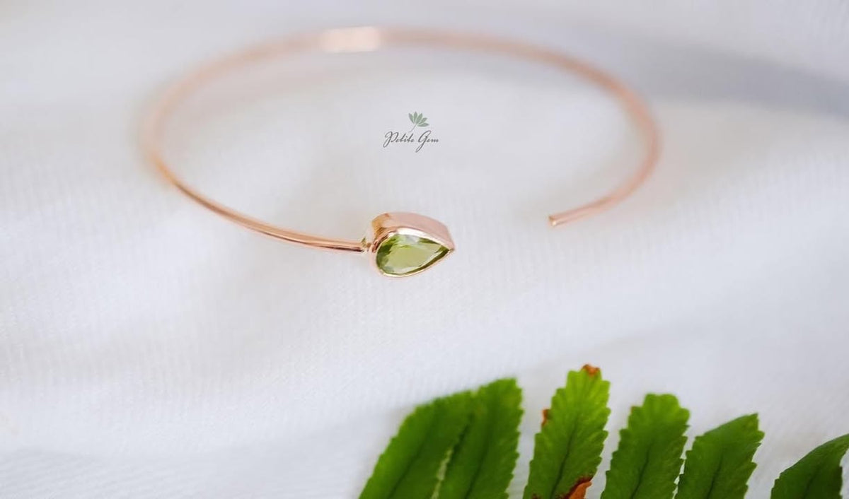 Lắc tay giọt đá peridot đính đá