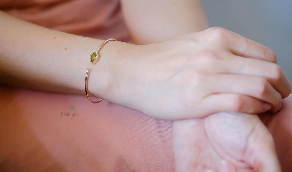 Lắc tay giọt đá peridot đính đá