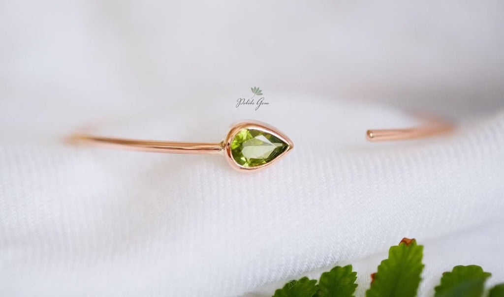 Lắc tay giọt đá peridot đính đá