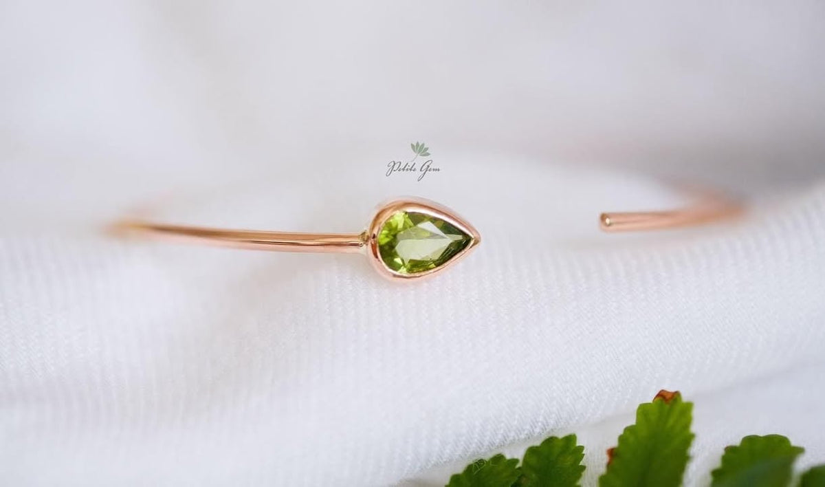 Lắc tay giọt đá peridot đính đá
