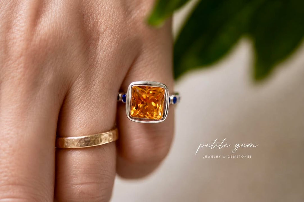 Nhẫn Citrine cắt cushion đính pha lê xanh