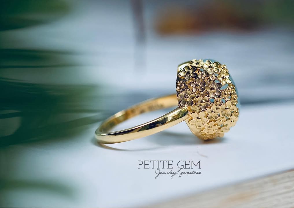 Nhẫn aquamarine hoa vàng · pg-facebook:490777502_1483922606344978_558582007142169177.jpg · batch:ac791956:0
